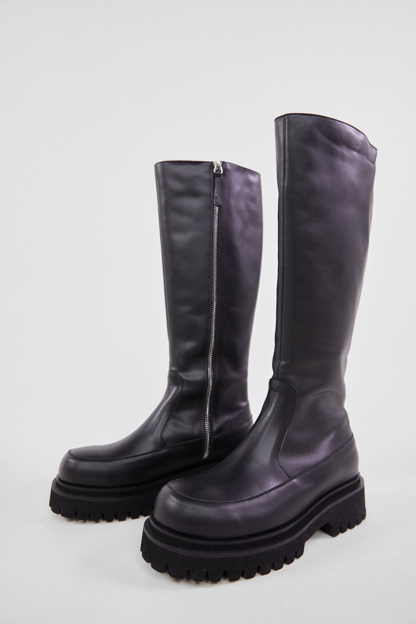 tall lug soled boots