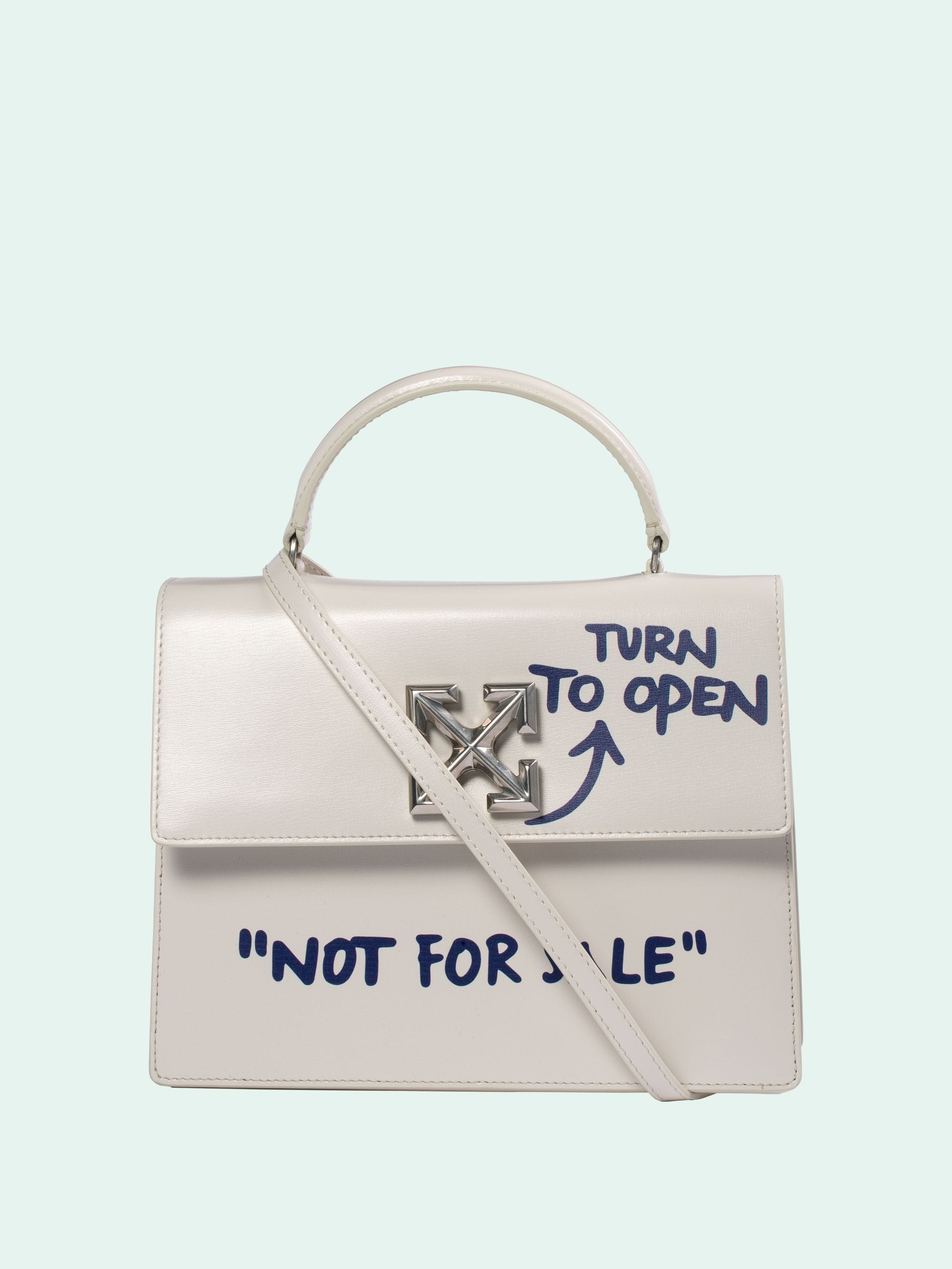 Italianist - For your wishlist: 2.8 Jitney bag in white with holes. White  top handle. Foldover flap with press-release fastening and removable  shoulder strap. #OffWhite #JItneybag #trend #handbags