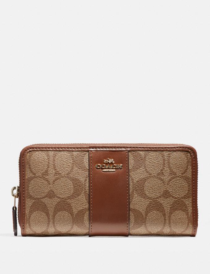 Coach + accordion zip wallet in signature canvas