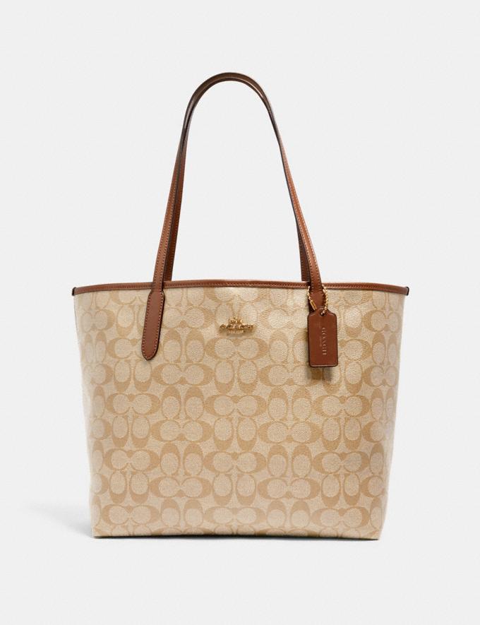 disney x coach city tote in signature canvas with patches