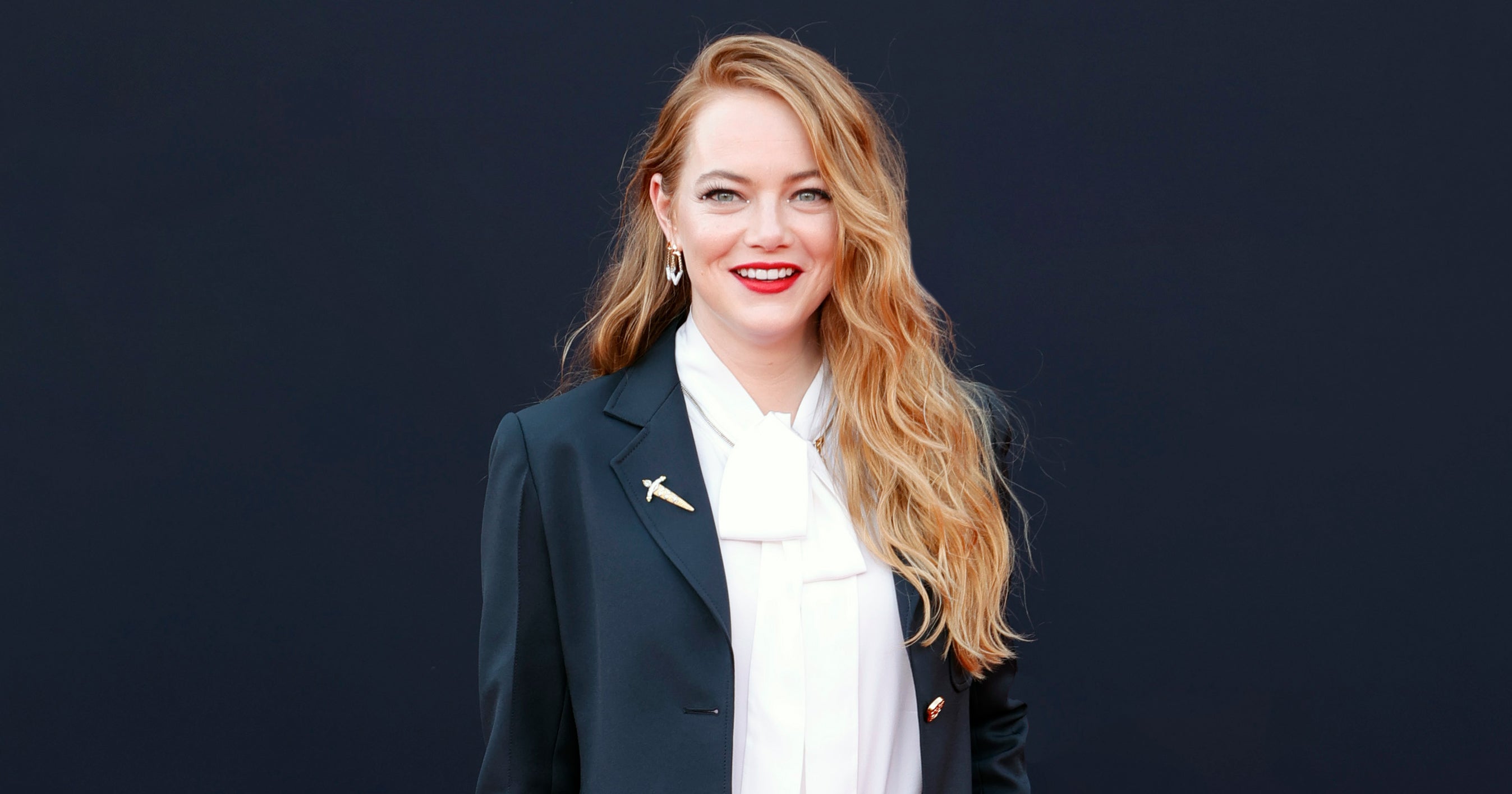 Emma Stone's Louis Vuitton Suit & Pointy Pumps Are Chic for 'Cruella' –  Footwear News