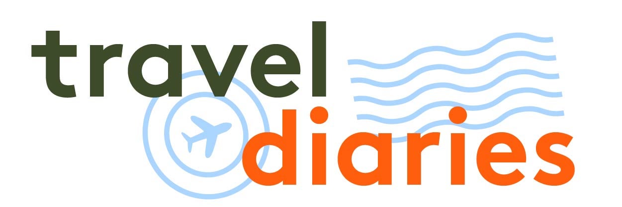 The Travel Diaries logo in green and orange lettering with an airplane inside two circles.