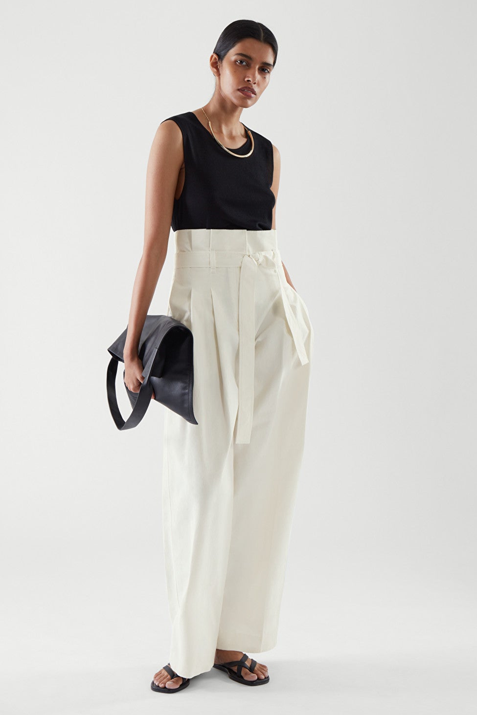 Black faux leather paperbag trousers | River Island