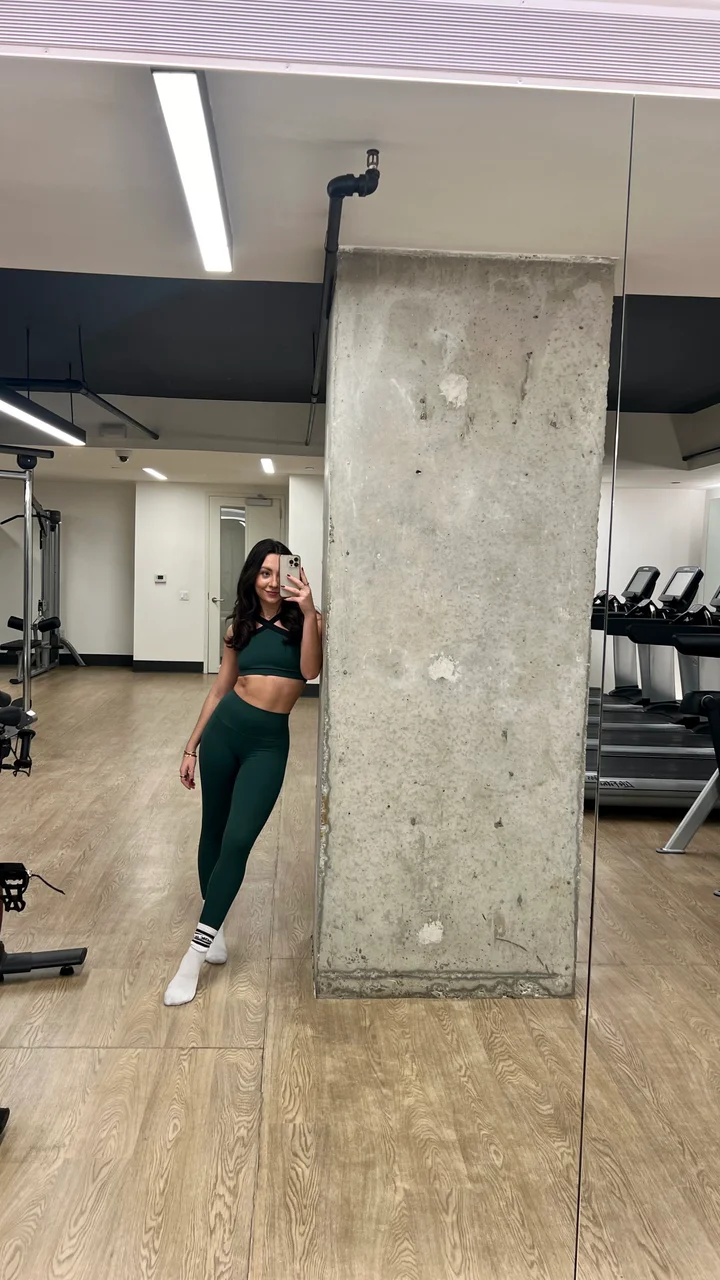 Karina wears Calvin Klein ribbed matching workout set leggings