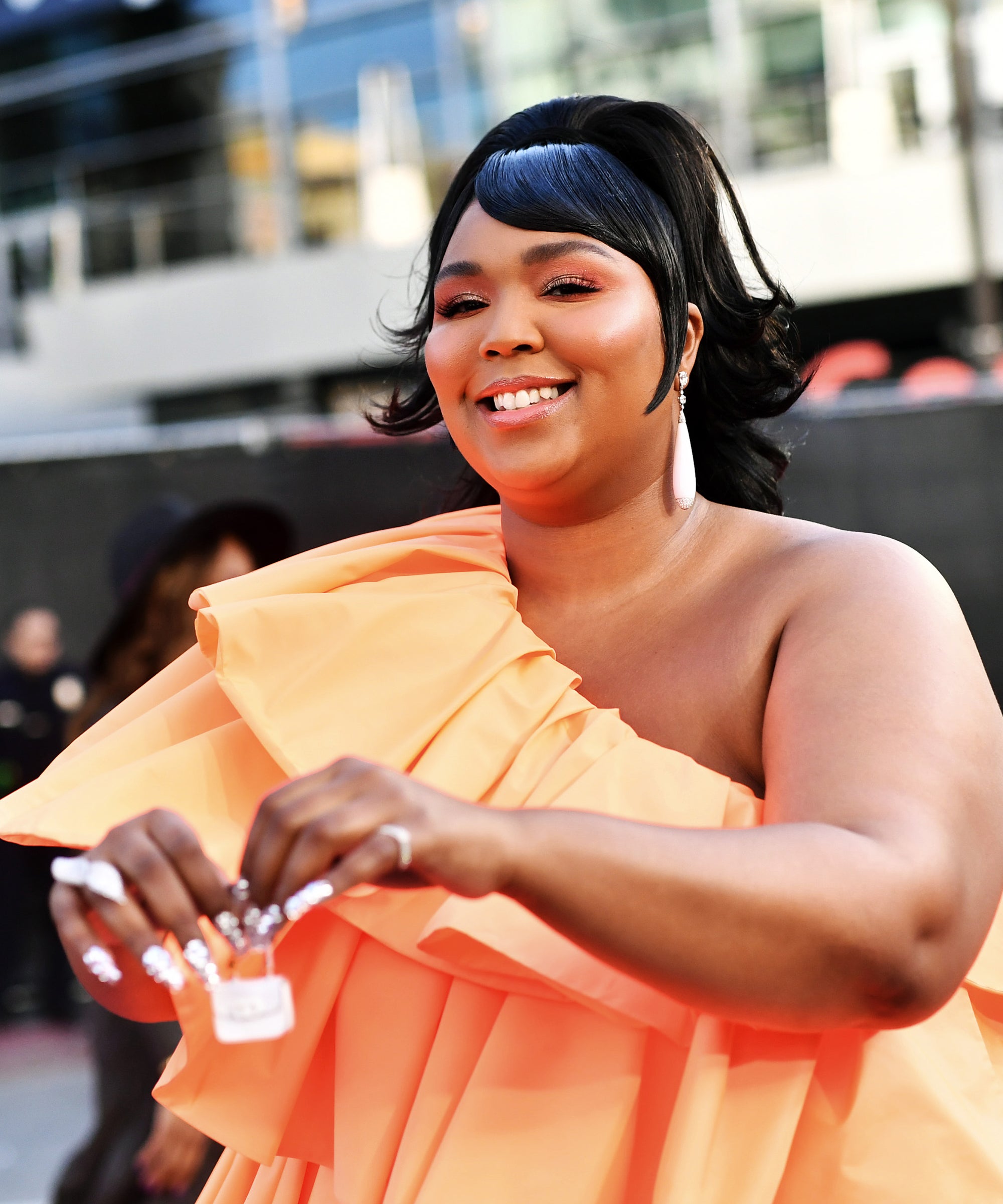 lizzo with small purse