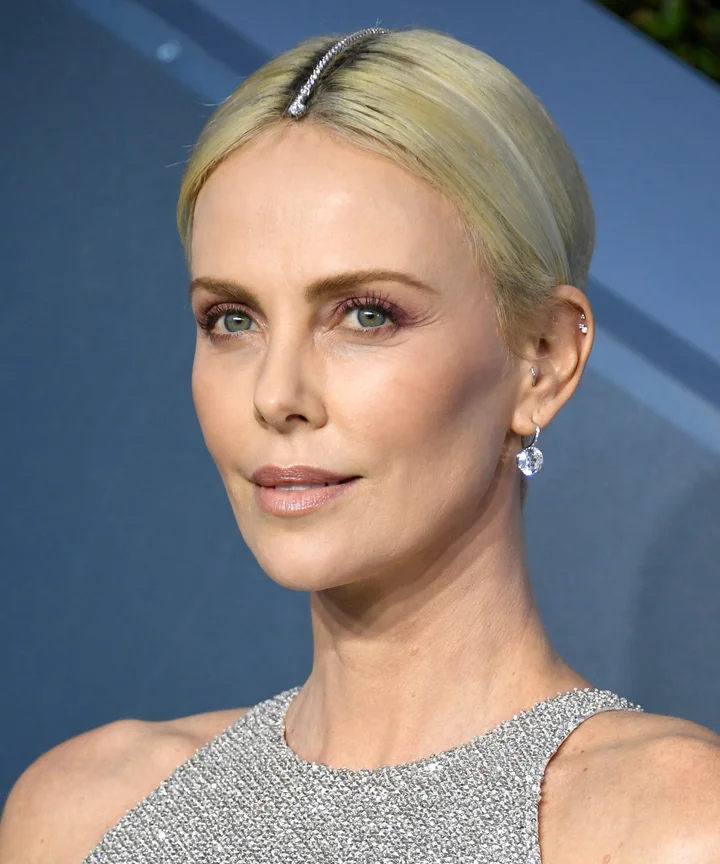 Charlize Theron Says Getting That Diamond Bracelet Out Of Her Hair Was A Disaster