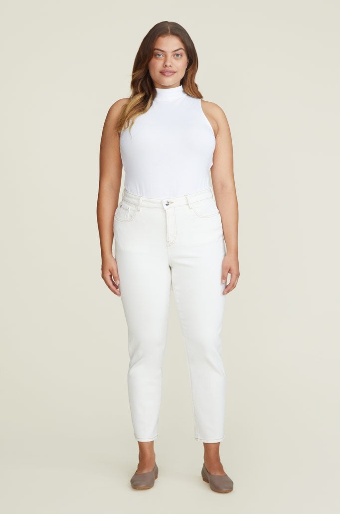 women wearing white jeans