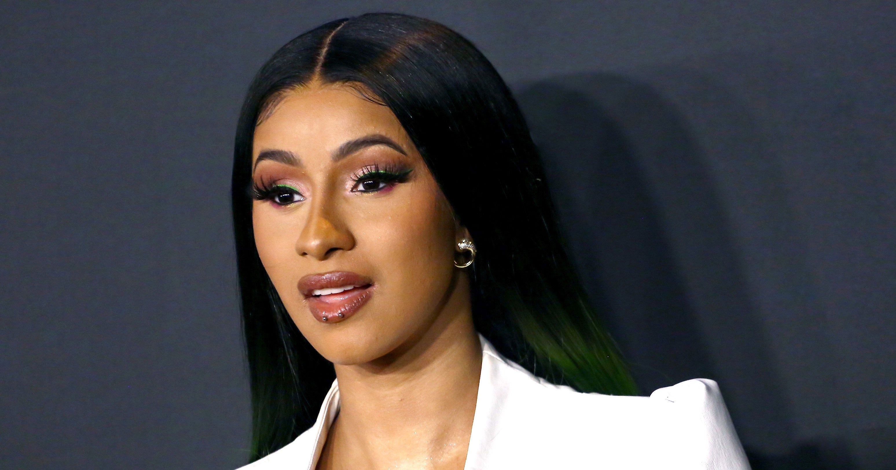 Cardi B Shows Off Piercings On Cover Of Elle Magazine