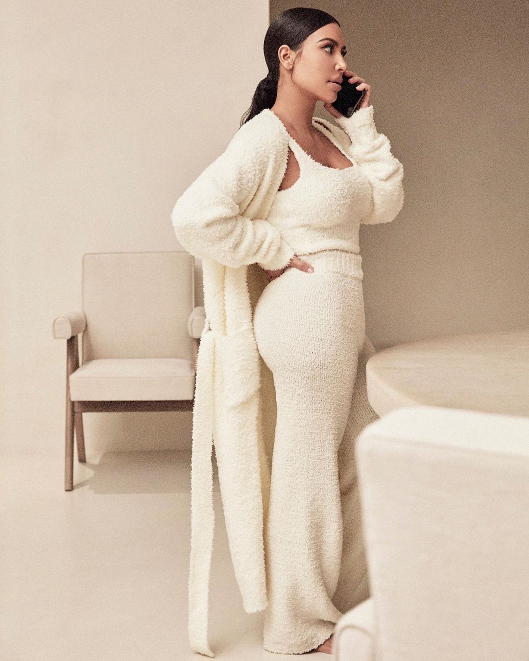 SKIMS on Instagram: Made from ultra-luxe bouclé knit yarn for supreme  comfort, @KimKardashian wears the Cozy Knit Wrap Top and Cozy Knit Pant in  Dusk. Shop Cozy in 8 styles, 5 colors